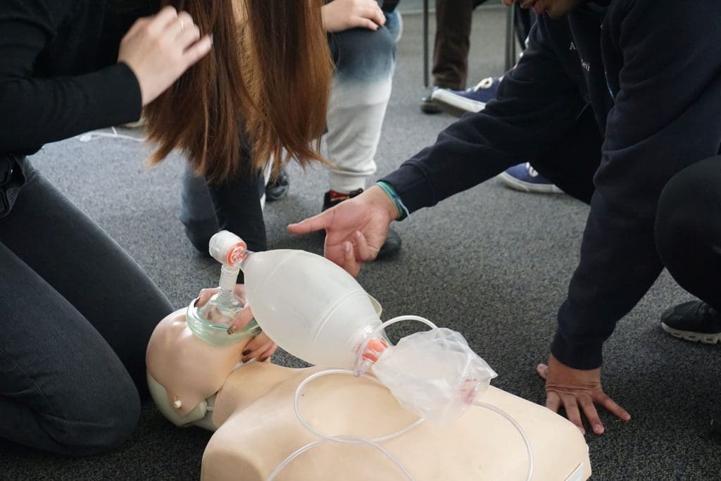 CPR training bag valve mask instructor help