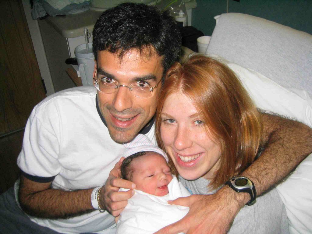 A photo of Prof. Hernandez together with his wife and newborn son