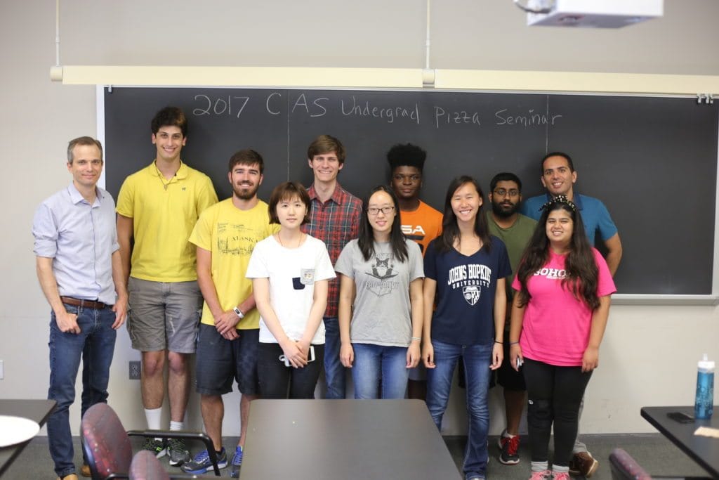 faculty advisor T. Marriage (left), postdoctoral advisor D. Nataf (right, top) and some of the Summer 2017 JHU CARE participants at the Pizza seminar