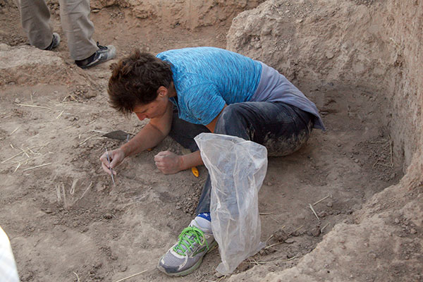 Jill Weber excavating a 1st millennium BC burial.