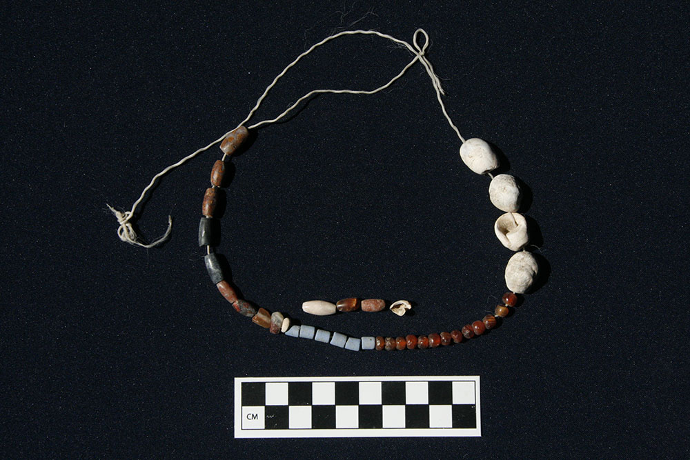 Beads from necklace, child burial
