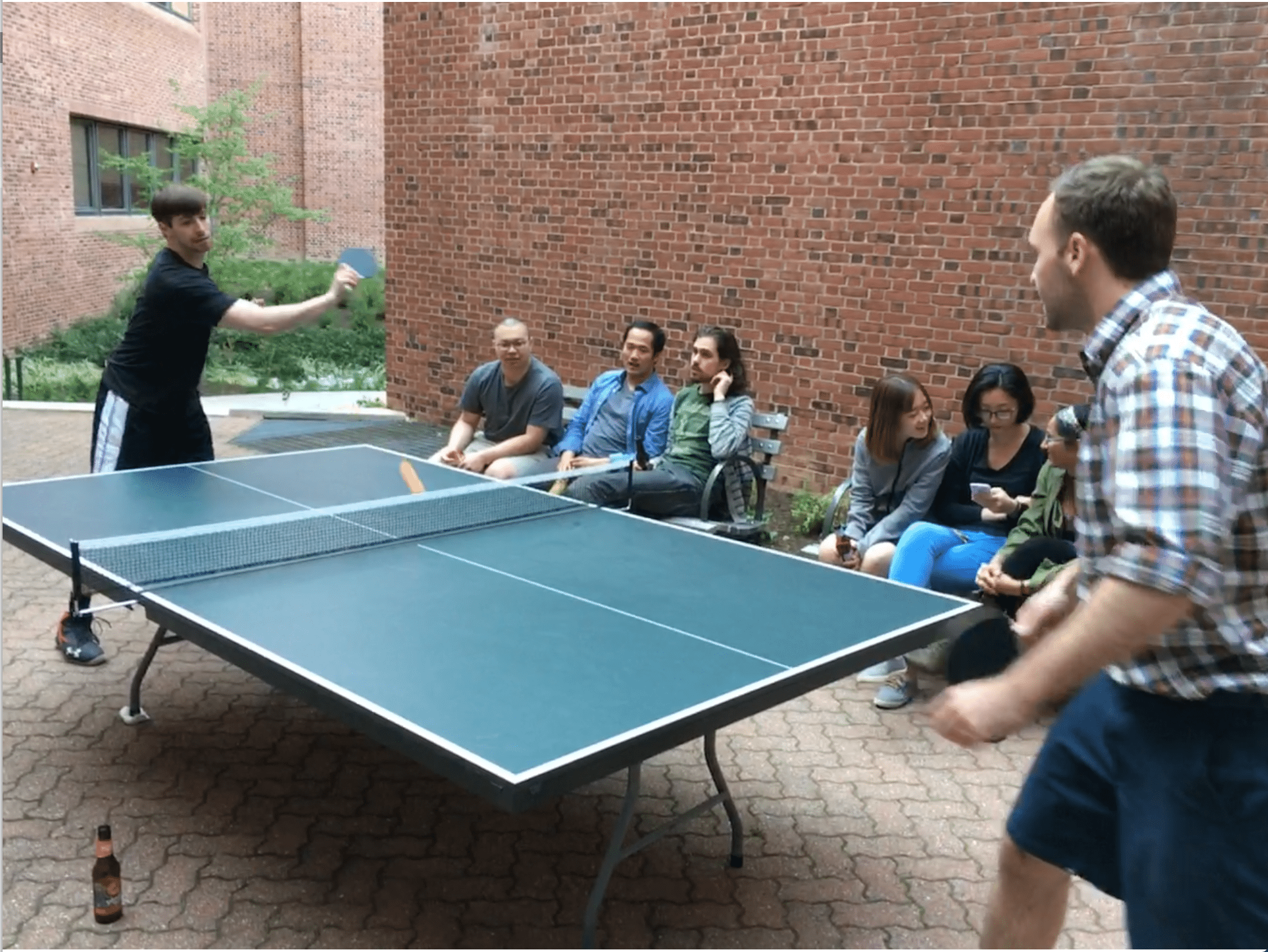 People playing ping pong