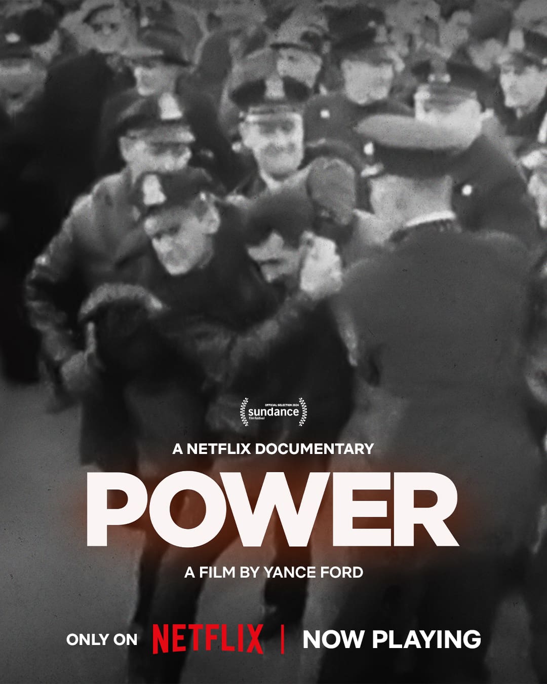 Power poster, with b+w image of person getting arrested and word Power in white